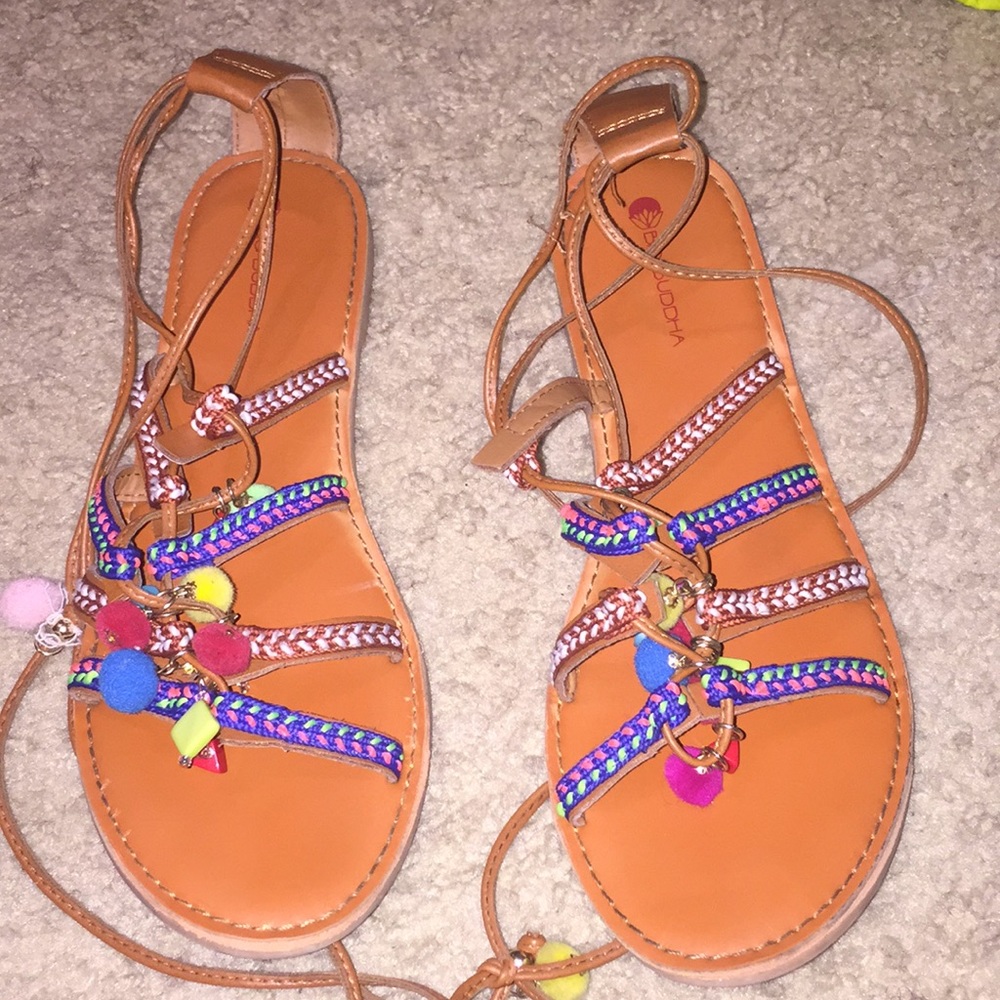 Gently used strap up Sandals
